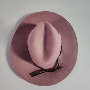 Pink fedora with added feather